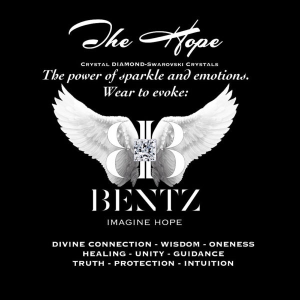 Digital ad for the Promise of Hope - Aura Collection with clear BB Swarovski logo on white angel wings and Bentz, Imagine Hope at the center. Surrounding white text reads, “The Hope. Crystal Diamond Swarovski Crystals. The power of sparkle and emotions. Wear to evoke: Divine Connection, Wisdom, Oneness, Healing, Unity, Guidance, Truth, Protection, Intuition.”